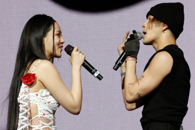 Bibi and Jackson Wang perform during the 88rising Futures showcase at the Mojave Tent during the 2024 Coachella Valley Music and Arts Festival