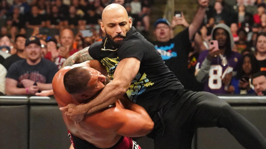 AEW star Ricochet and Bron Breakker brawling on an episode of WWE RAW