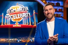 Travis Kelce stands in Are You Smarter Than a Celebrity?