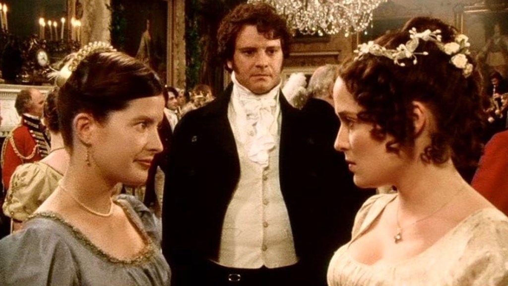 Two women stare at each other with a men behind them in Pride and Prejuidice.