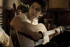 Timothee Chalamet strums the guitar in A Complete Unknown.