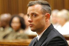 South African Paralympian Oscar Pistorius looks on inside the dock at the high court in Pretoria, on June 14, 2016 on the second day of South African Paralympian Oscar Pistorius pre sentencing hearing set to send him back to jail for murdering his girlfriend three years ago. The double-amputee killed Reeva Steenkamp, a model and law graduate, in the early hours of Valentine's Day in 2013, saying he mistook her for an intruder when he fired four times through the door of his bedroom toilet.