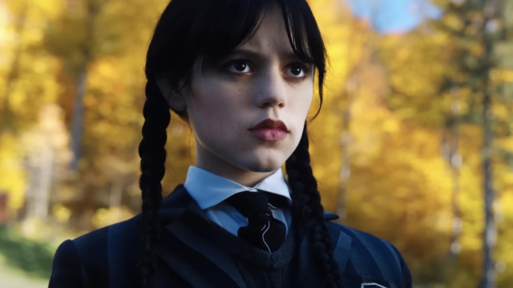 Jenna Ortega stares into the distance in Wednesday.