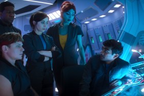 A group of astronauts stand around.