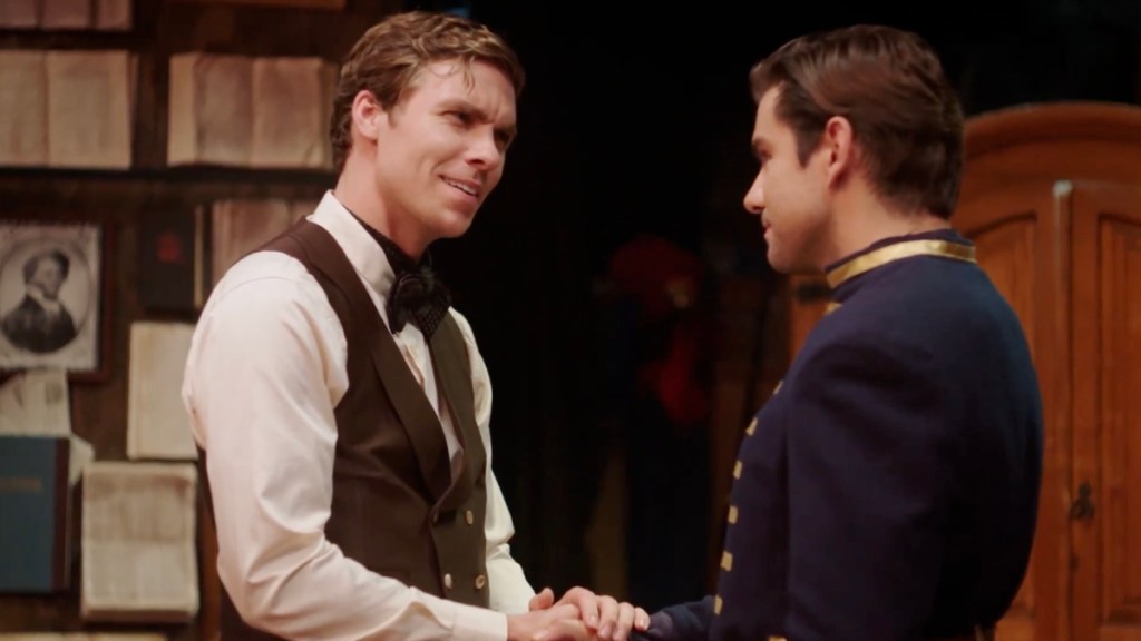 Abe Lincoln and Elmer Ellsworth shaking hands in the trailer of Lavender Men.