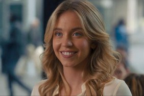 Sydney Sweeney smiles and stares.