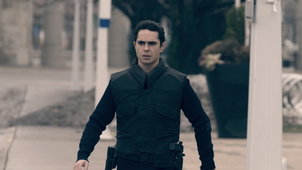 What Did Nick Throw in That Fire in The Handmaid’s Tale?