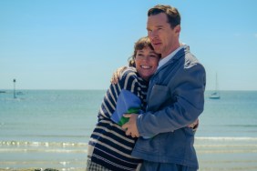 Olivia Colman hugs Benedict Cumberbatch.