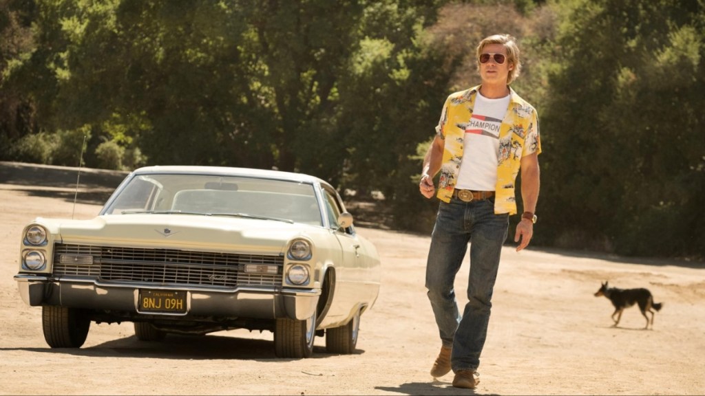 Brad Pitt walks on the dirt in Once Upon a Time in Hollywood.