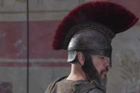 Matt Damon turns and looks in The Odyssey.