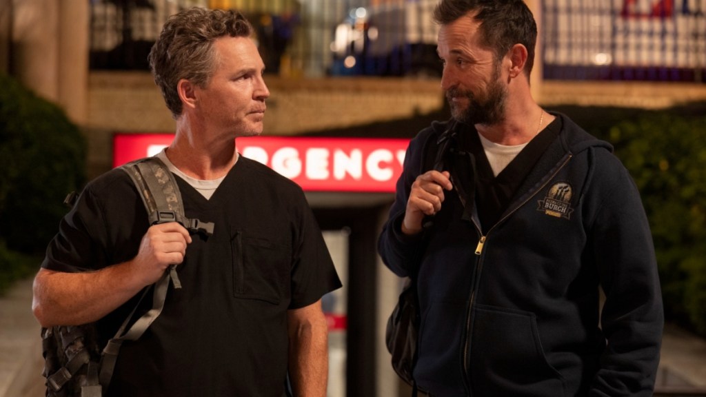 Two doctors look at each other.